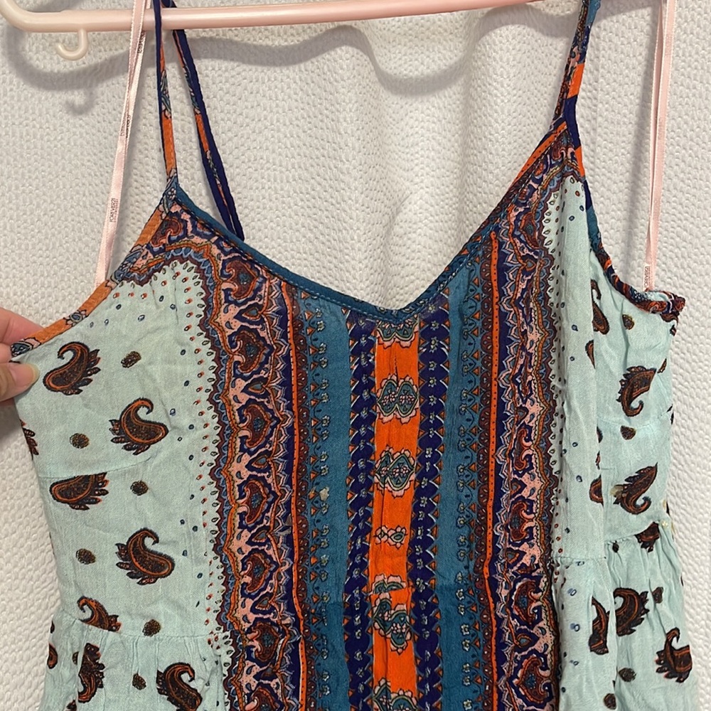 Light weight short thin strap romper with cute patterns.